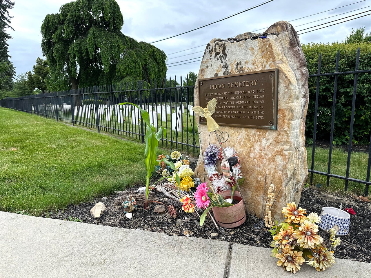 A plaque marks the entrance to the cemetery on the former grounds of the Carlisle Indian Industrial School. 