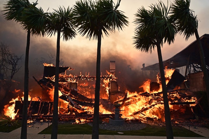 A home burns during the Palisades Fire.