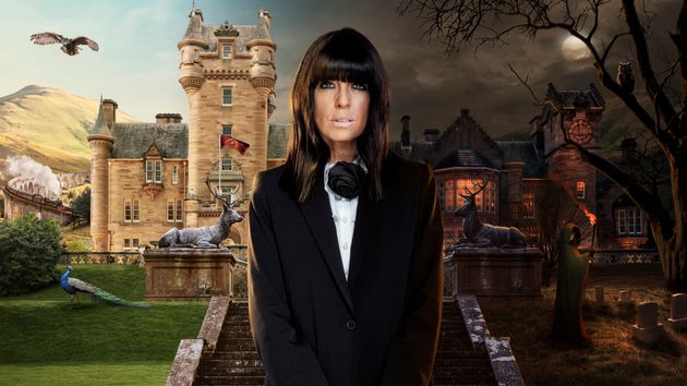 Claudia Winkleman in front of the famous Traitors castle.