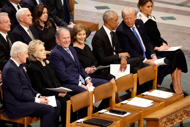 From left (back row): Former U.S. Vice Presidents Al Gore and Mike Pence and Karen Pence and (front row) former U.S. President Bill Clinton, former Secretary of State Hillary Clinton, former U.S. President George W. Bush, Laura Bush, former U.S. President Barack Obama, U.S. President-elect Donald Trump and Melania Trump attend the state funeral for former U.S. President Jimmy Carter at Washington National Cathedral Thursday in Washington, D.C.