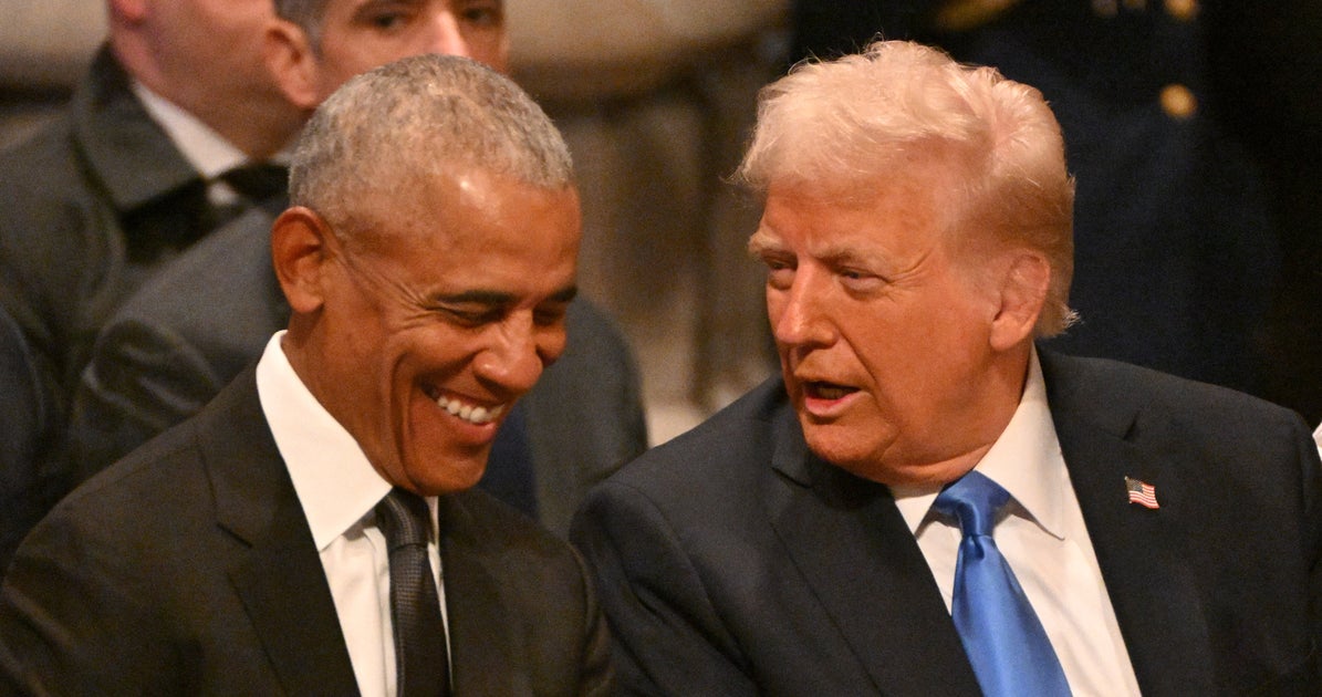 NextImg:Watch Barack Obama Laugh At Something Donald Trump Says At Jimmy Carter’s Funeral