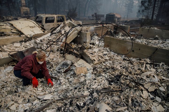 Residents return to their burned home on Nov. 15, 2018, to try to recover items from the rubble after the Camp fire raced through Paradise, California.