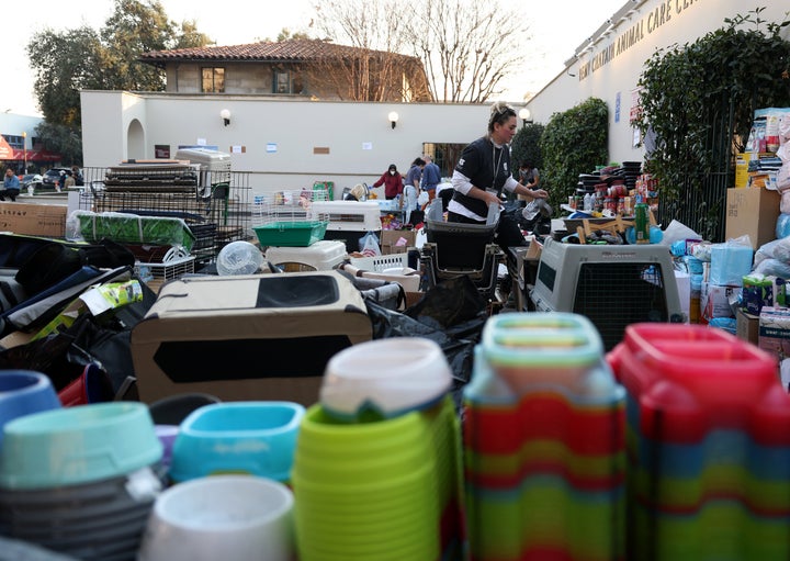 A volunteer arranges donated pet items at the Pasadena Humane Society on January 10, 2025 in Pasadena, California. Hundreds of pets have been displaced by the Eaton Fire and many residents have had to shelter their pets at the Pasadena Humane Society. (Photo by Justin Sullivan/Getty Images)