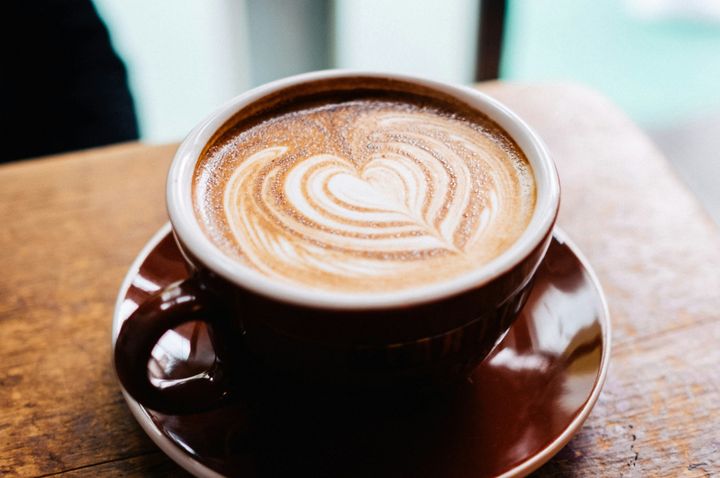 Coffee with heart shape in its foam