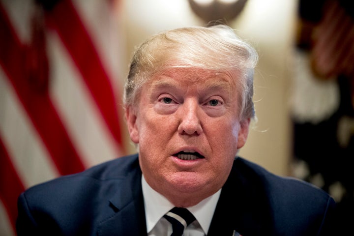 US President Donald Trump speaks to members of the media as he meets with members of Congress in the Cabinet Room of the White House on Tuesday.