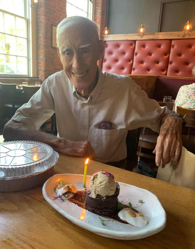 The author's father enjoying his birthday cake in Chapel Hill, North Carolina, in September 2023.