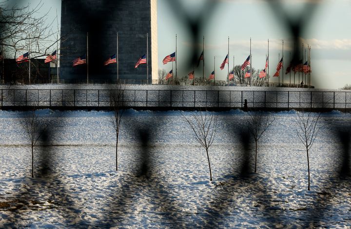 Temporary fencing around the base of the Washington Monument in security preparations for the upcoming inauguration ceremony of President-elect Donald Trump.