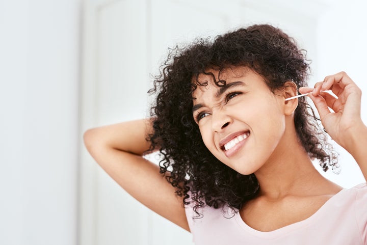 Cleaning your ear with a Q-tip is a big no-no, according to audiologists.