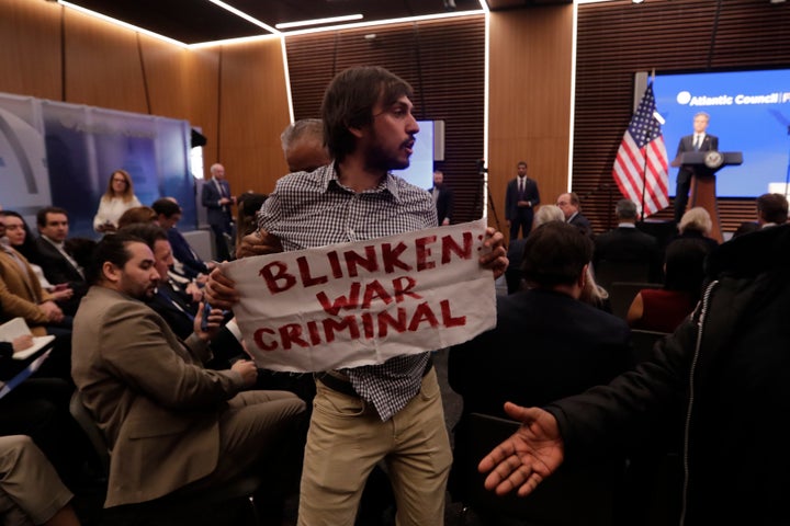 A protester interrupts outgoing Secretary of State Antony Blinken during a speech Tuesday about the Middle East at the Atlantic Council in Washington, D.C.