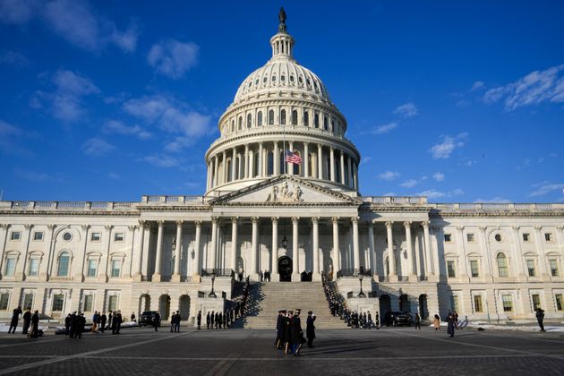 Members of the military march on the East Front of the U.S. Capitol during a rehearsal ahead of President-elect Donald Trump's upcoming inauguration, Sunday, Jan. 12, 2025, in Washington.