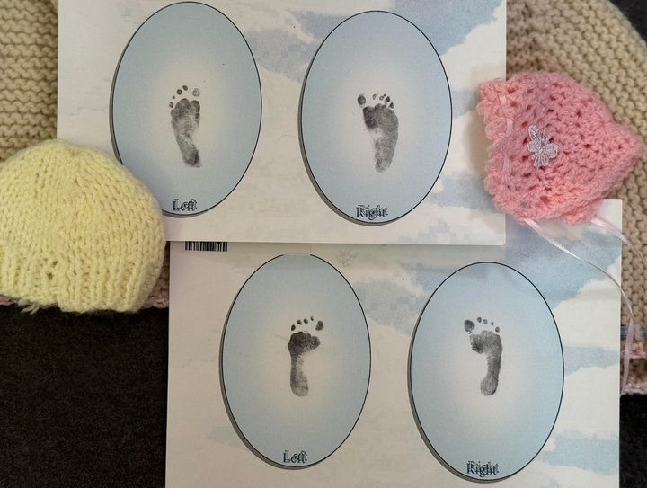 Footprints and hats belonging to the author's children Peaceful and Beautiful.