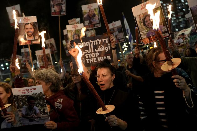 Relatives and friends of people killed and abducted by Hamas and taken into Gaza, react to the ceasefire announcement as they take part in a demonstration in Tel Aviv, Israel.