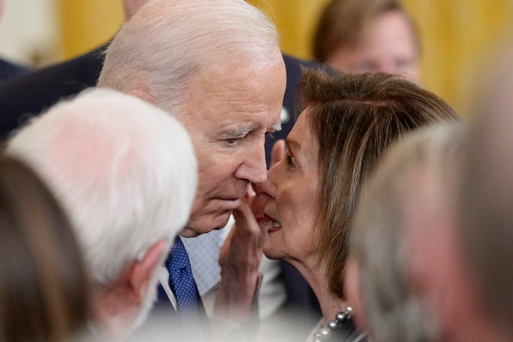 Pelosi and President Biden in the East Room of the White House in March 2023.