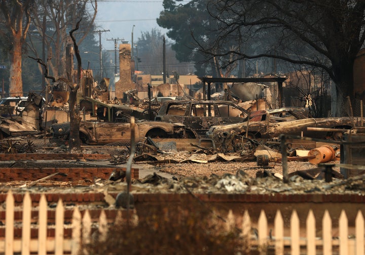 A view of homes destroyed by the Eaton Fire in Altadena, California. A disabled father and son died waiting for help in the foothill community. 