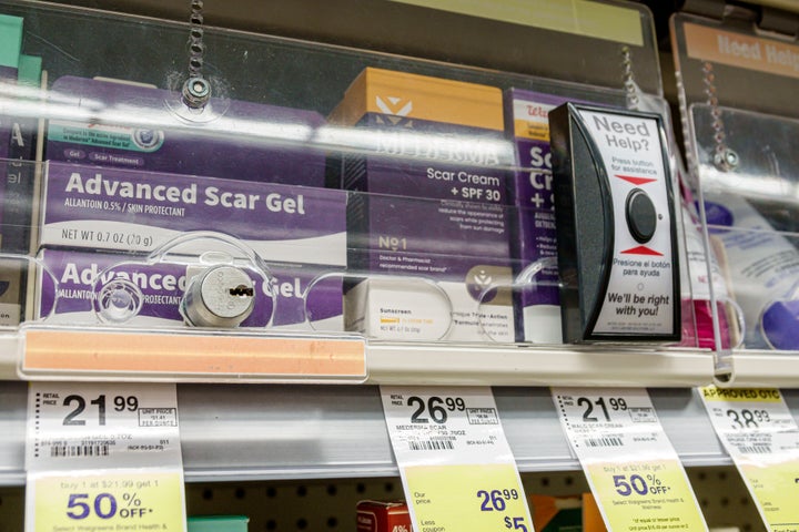 Products are locked inside security shelves at a Walgreens store in Miami, Florida. The pharmacy chain says that such anti-theft measures have a negative impact on sales.