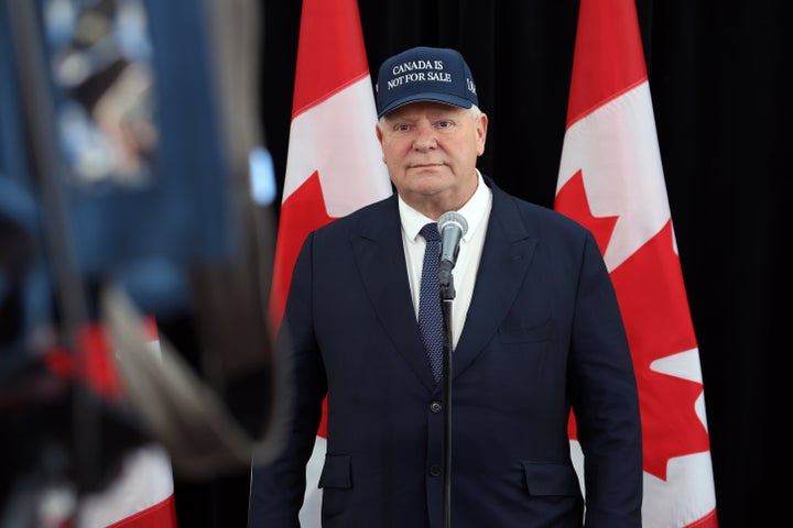 Doug Ford, Ontario's premier, wears a "Canada Is Not For Sale" hat during the First Ministers' Meeting in Ottawa on Wednesday.