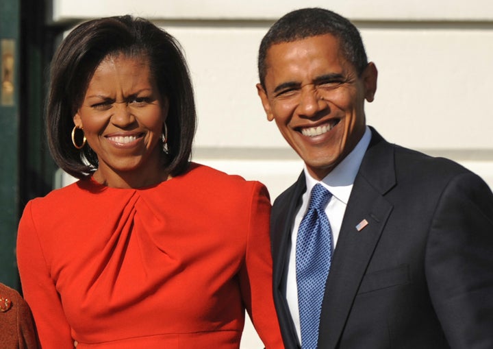 Michelle Obama, then the incoming first lady, stands to the left of Democrat Barack Obama at an entrance to the White House on Nov. 10, 2008, in Washington, shortly after his presidential election win.