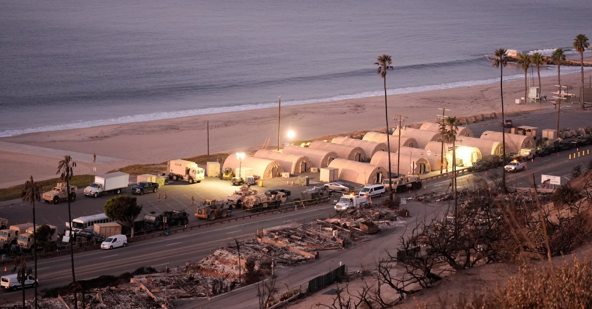 NextImg:Ash And Other Dangers Mean LA Area Residents Who Fled Fires Won't Be Going Home Soon