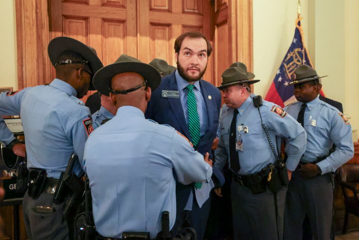 Sen. Colton Moore, R-Trenton, is detained by Georgia State Patrol as Moore attempted to enter the state House of Representatives for the state of the state address at the Georgia Capitol, Thursday, Jan. 16, 2025, in Atlanta. (Jason Getz/Atlanta Journal-Constitution via AP)