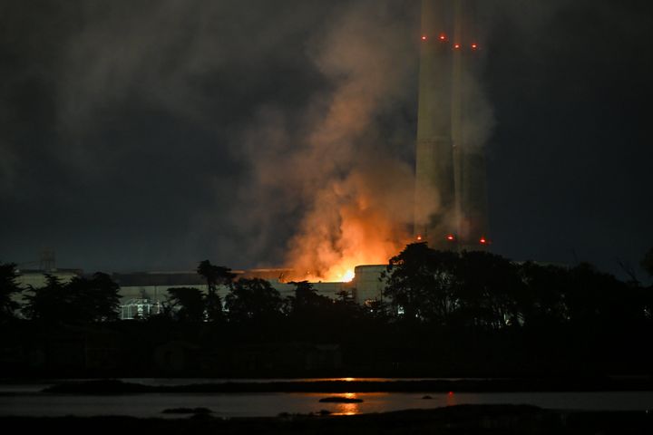 A view of flames and giant smoke cover the sky as a fire erupted at Moss Landing Power Plant on Thursday that located on Pacific Coast Highway in Moss Landing of Monterey Bay, California, United States on January 17, 2025. (Photo by Tayfun Coskun/Anadolu via Getty Images)