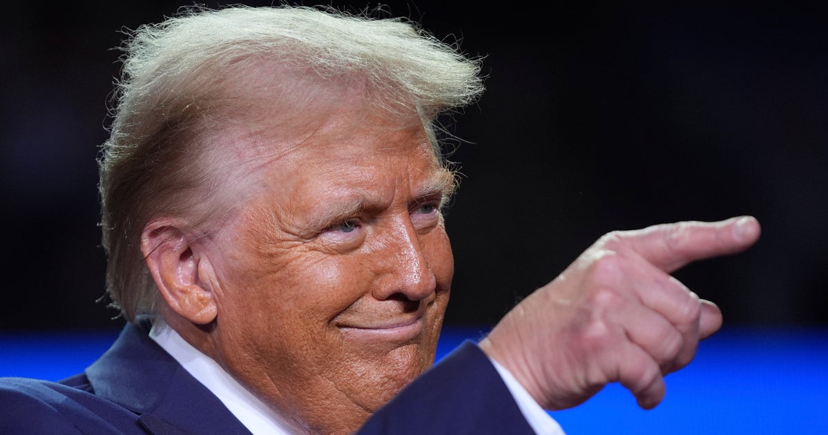 NextImg:Trump's New Official Portrait Tells Quite The Story. Body Language Experts Explain Why.