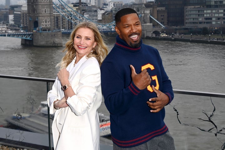 Cameron Diaz and Jamie Foxx attend the photocall for "Back In Action" at Cheval Three Quays on Jan. 17 in London, England.