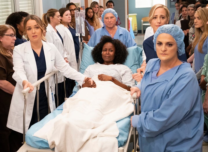 Finch (front right), was cast as an extra in a 2019 "Grey's" episode after feigning cancer.