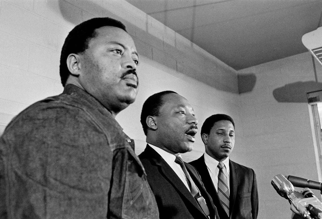 The Rev. Martin Luther King, flanked by Hosea Williams (left) and the Rev. Bernard Lafayette, discusses plans for a poor people's march on Washington at an Atlanta news conference on Jan. 16, 1968. Williams was field director of the project and Lafayette coordinated the march.