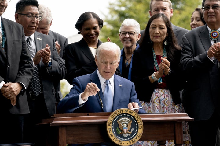 President Joe Biden signs a proclamation in Oct. 2021 reversing Donald Trump's 2017 decision to shrink Bears Ears National Monument by nearly 85% and Grand Staircase-Escalante National Monument by almost half.