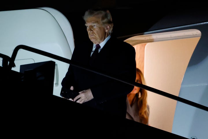 DULLES, VIRGINIA - JANUARY 18: U.S. President-elect Donald Trump his wife Melania Trump and their son Barron Trump arrive at Dulles International Airport on January 18, 2025 in Washington, DC. Trump will later visit his golf course in Sterling, Virginia to participate in a reception and fireworks show. (Photo by Anna Moneymaker/Getty Images)