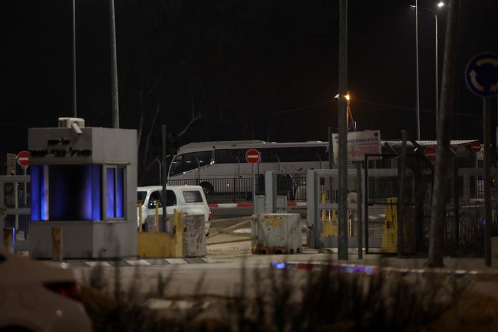 A Red Cross bus carrying freed Palestinian prisoners leaves the Ofer military prison, located between Ramallah and Beitunia in the occupied West Bank, on Jan. 20, 2025. The release came hours after Hamas released three Israeli hostages in the Gaza Strip.