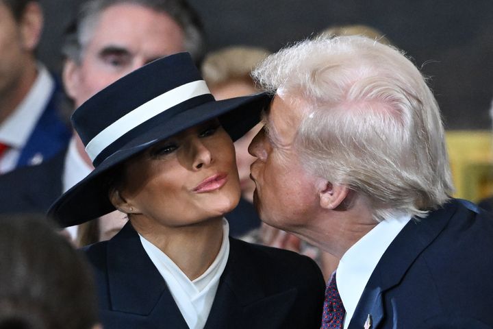 President Donald Trump kisses Melania Trump at his inauguration in the U.S. Capitol Rotunda on Jan. 20 in Washington, D.C.