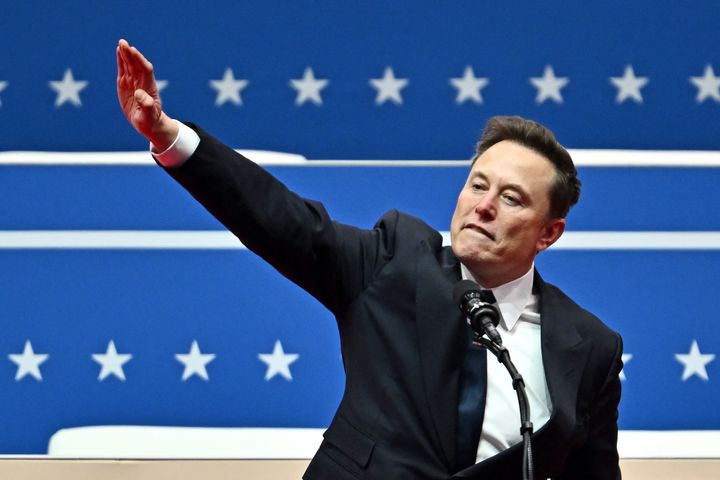 Tesla and SpaceX CEO Elon Musk gestures as he speaks during the inaugural parade inside Capitol One Arena, in Washington, DC, on January 20, 2025. 