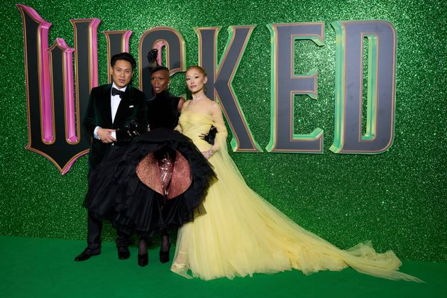 Wicked director Jon M Chu with cast members Cynthia Erivo and Ariana Grande