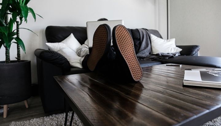 Worker with his feet up on the desk