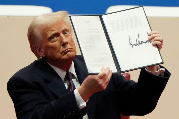 Donald Trump holds up an executive order he signed immediately after becoming president. Do you really want to take at stab at dictating how embryonic cell development works, sir?