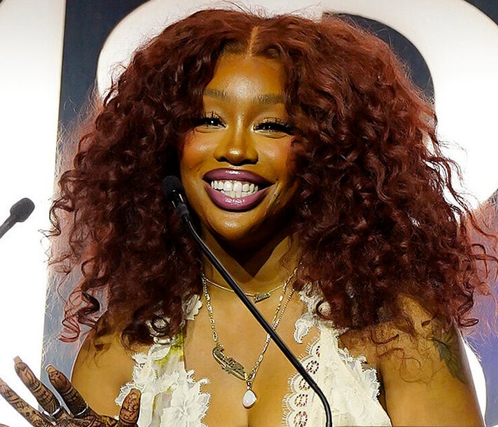 SZA, shown here accepting the Hitmaker of the Year award on on Dec. 2, 2023, in Hollywood, faced burning questions on a "Hot Ones" episode that aired Tuesday.