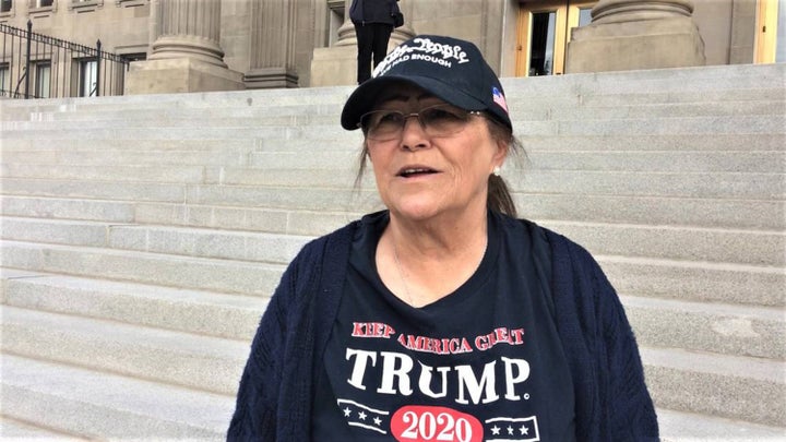 Pam Hemphill is seen on the steps of the Idaho Capitol in 2020. Hemphill served two months in prison after participating in the 2021 attack.