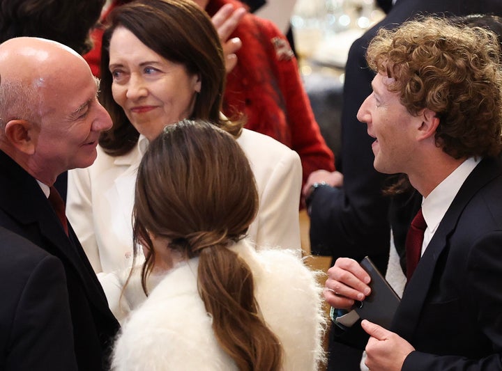 Bezos and Zuckerberg share a laugh at Monday's presidential inauguration.