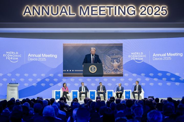  US President Donald Trump is seen on a giant screen during his address by video conference at the World Economic Forum (WEF) annual meeting in Davos on January 23, 2025. 