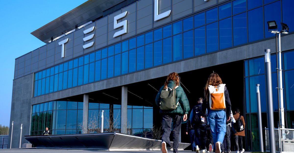 Activist Group Projects ‘Heil’ Message On Berlin Tesla Factory After Elon Musk Salute