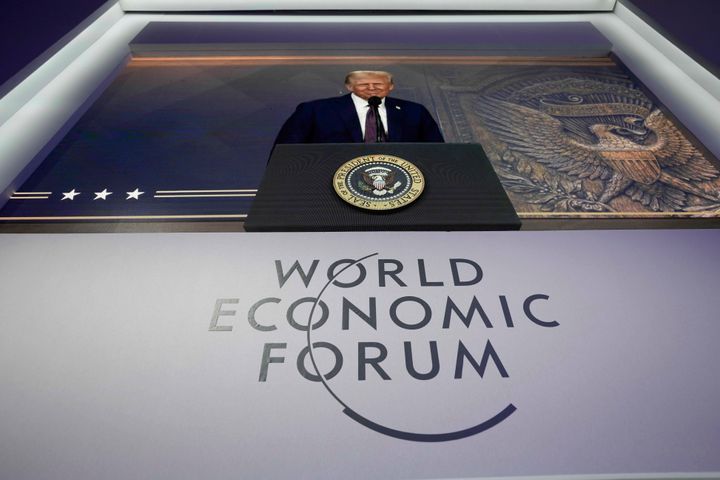 U.S. president Donald Trump is seen on a screen during his virtual speech at the Annual Meeting of World Economic Forum in Davos, Switzerland, Thursday, Jan. 23, 2025. (AP Photo/Markus Schreiber)