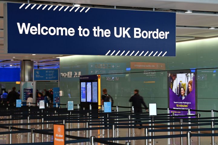 UK border signage is pictured at the passport control in Arrivals in Terminal 2 at Heathrow Airport in London.