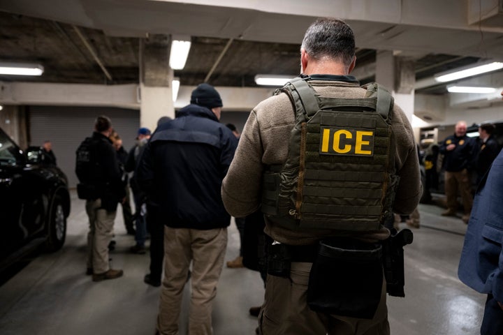 ICE agents, along with other federal law enforcement agencies, attend a pre-enforcement meeting in Chicago on Sunday, Jan. 26, 2025.