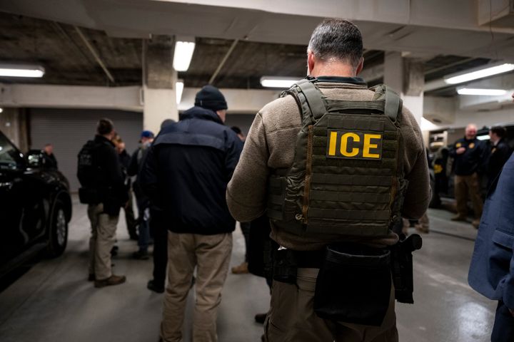 ICE agents, along with other federal law enforcement agencies, attend a pre-enforcement meeting in Chicago on Sunday, Jan. 26, 2025. 