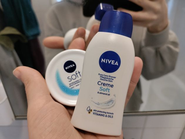 Writer holding Nivea containers