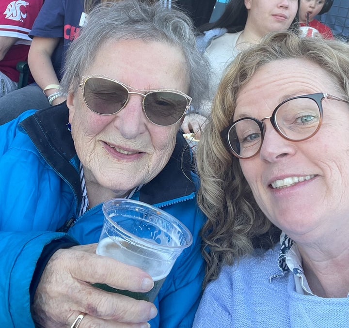 The author and her mother, enjoying a baseball game and a brew last summer.