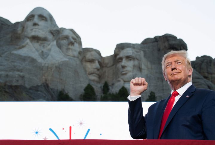 President Donald Trump pumps his fist as he arrives for the Independence Day events at Mount Rushmore National Memorial in Keystone, South Dakota, in 2020.