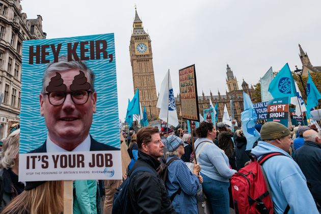 Thousands of environmental campaigners from over 130 organisations pass the Houses of Parliament during a March for Clean Water on 3rd November 2024.