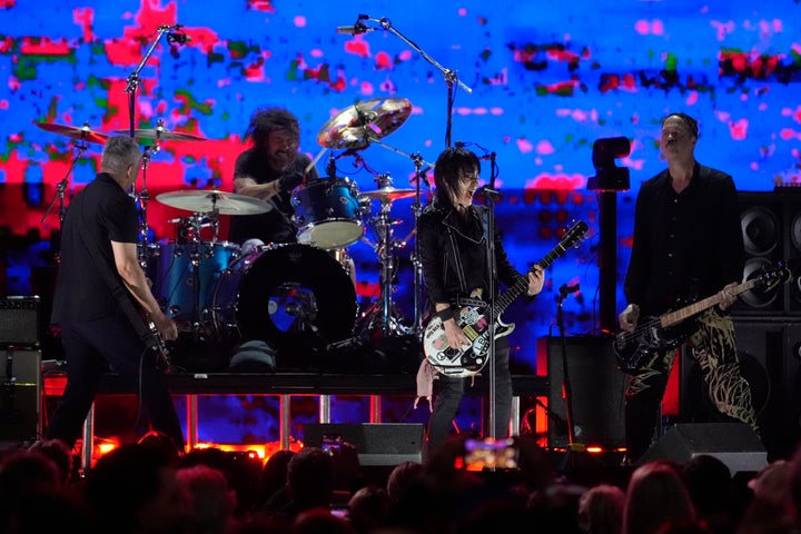 Joan Jett, second from right, performs with Pat Smear, from left, Dave Grohl, and Krist Novoselic of Nirvana during the FireAid benefit concert on Jan. 30, 2025, at The Forum in Inglewood, Calif.